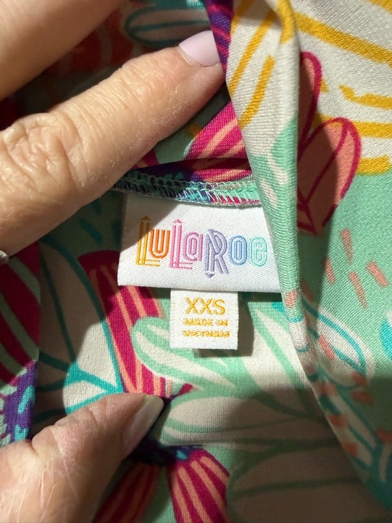 LuLaRoe Dresses & Skirts - LuLaRoe Floral Print Top - Mint, Pink, Yellow, Teal